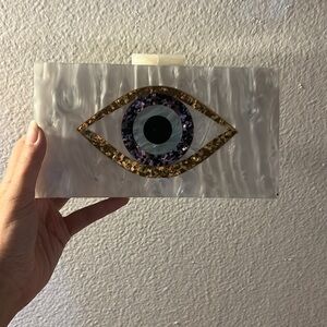 Evil eye clutch
